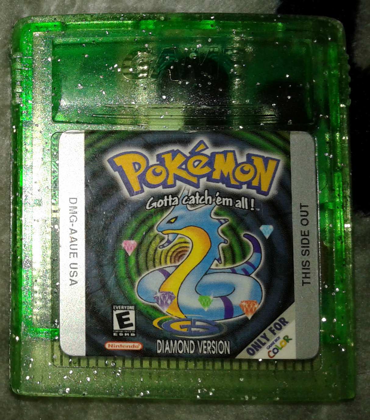 A GameBoy Color cartridge of the infamous bootleg English translation of Keitai Denjuu Telefang, labeled as “Pokémon Diamond”